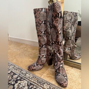 Women’s faux snakeskin knee high boots